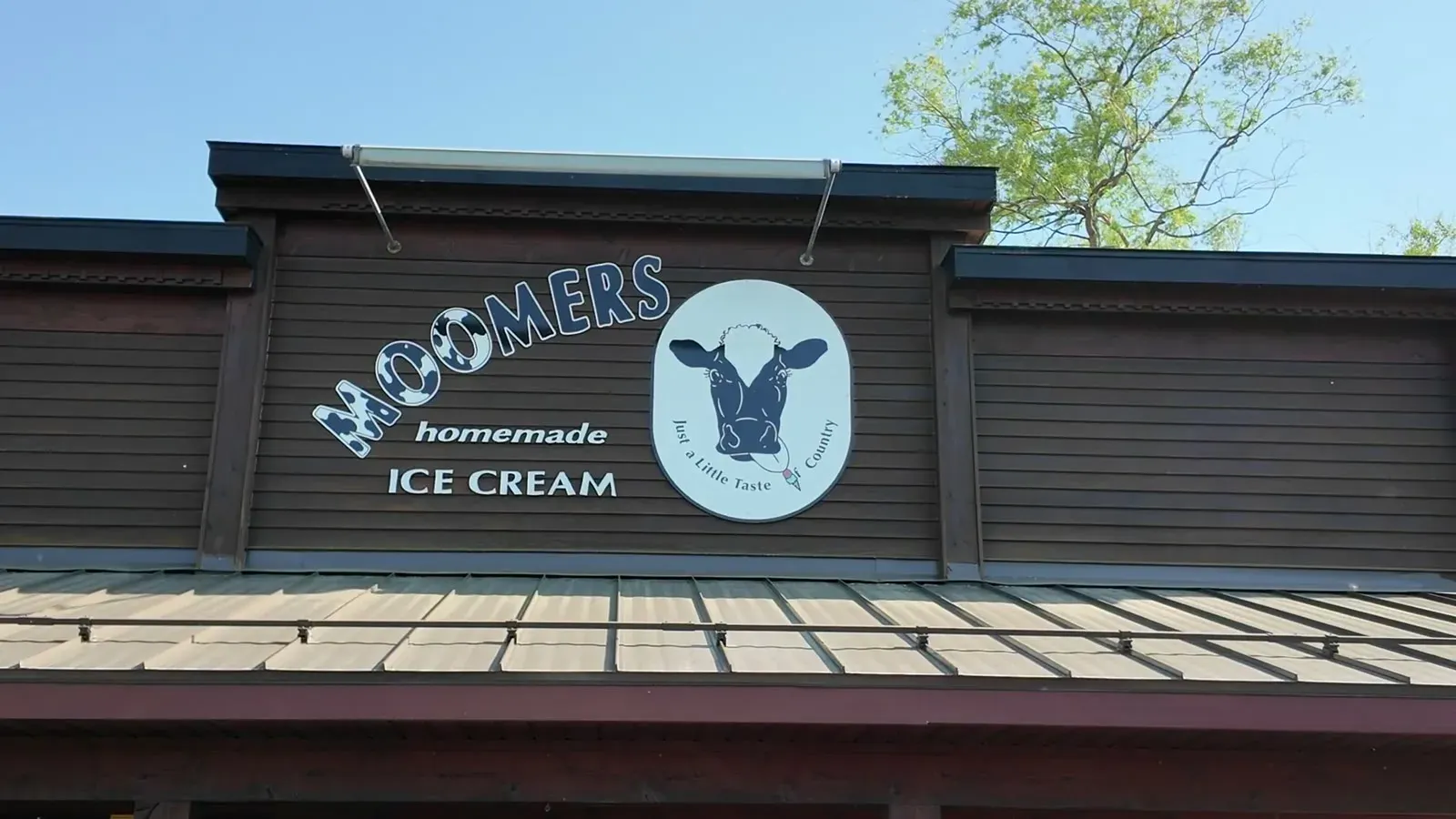 The Moomers Homemade Ice Cream storefront in Traverse City, our reward stop after the dunes.