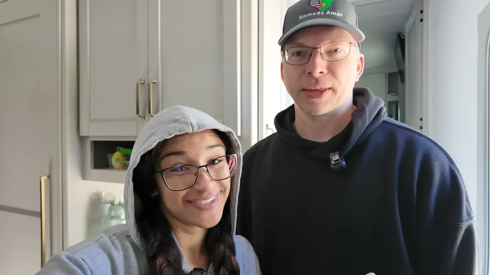 Fabiola and Nathan in the RV kitchen giving the honest three-month verdict on the Brinkley.