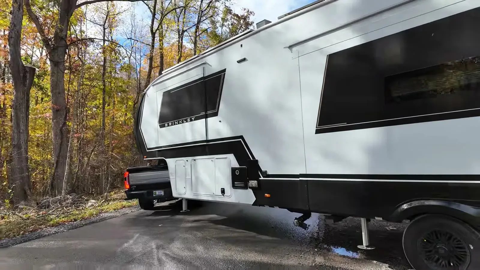 The F-350 towing our Brinkley fifth wheel through a mountain turn