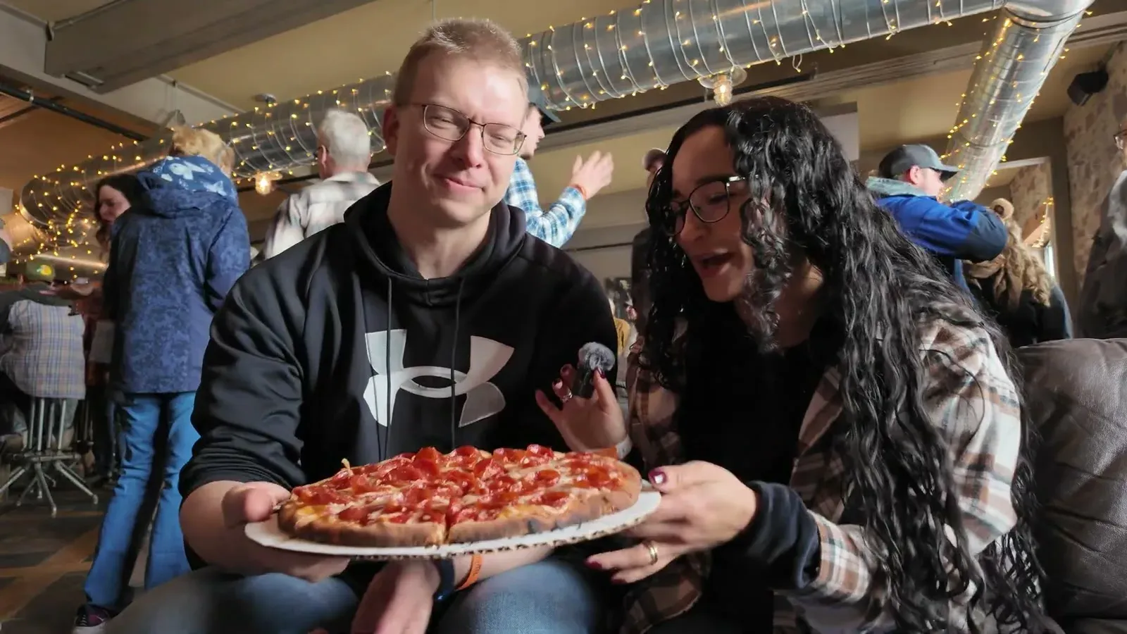 Holding a fresh pepperoni pie from the Smelted Wood Fired Pizza truck, straight out of the oven.
