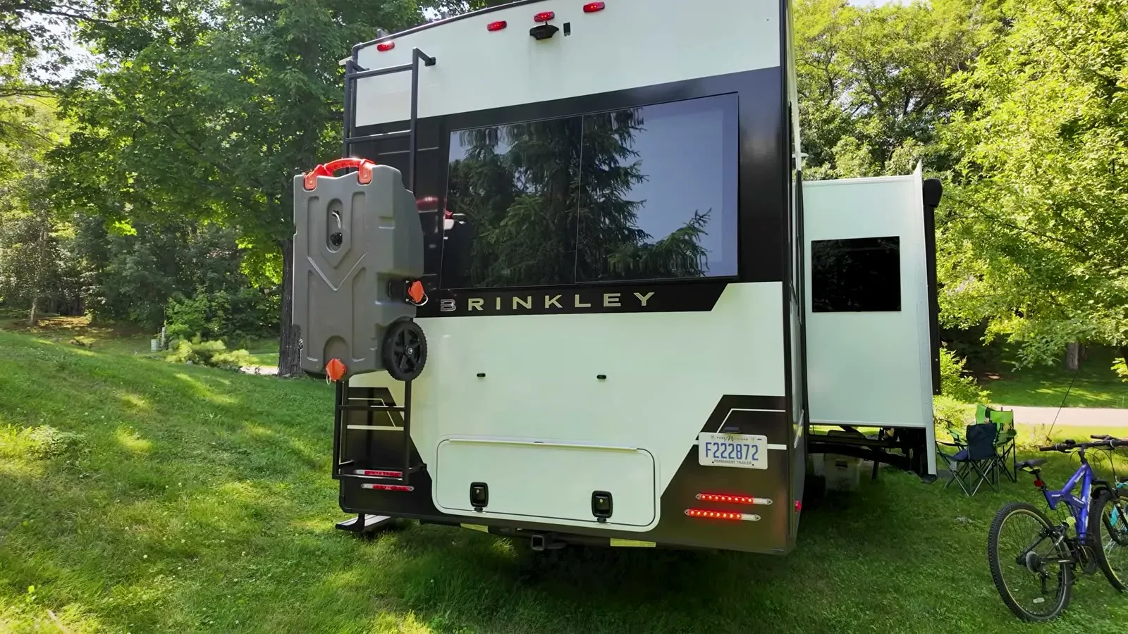 The back of our Brinkley with the tail lights lit up during another round of testing at the campsite.