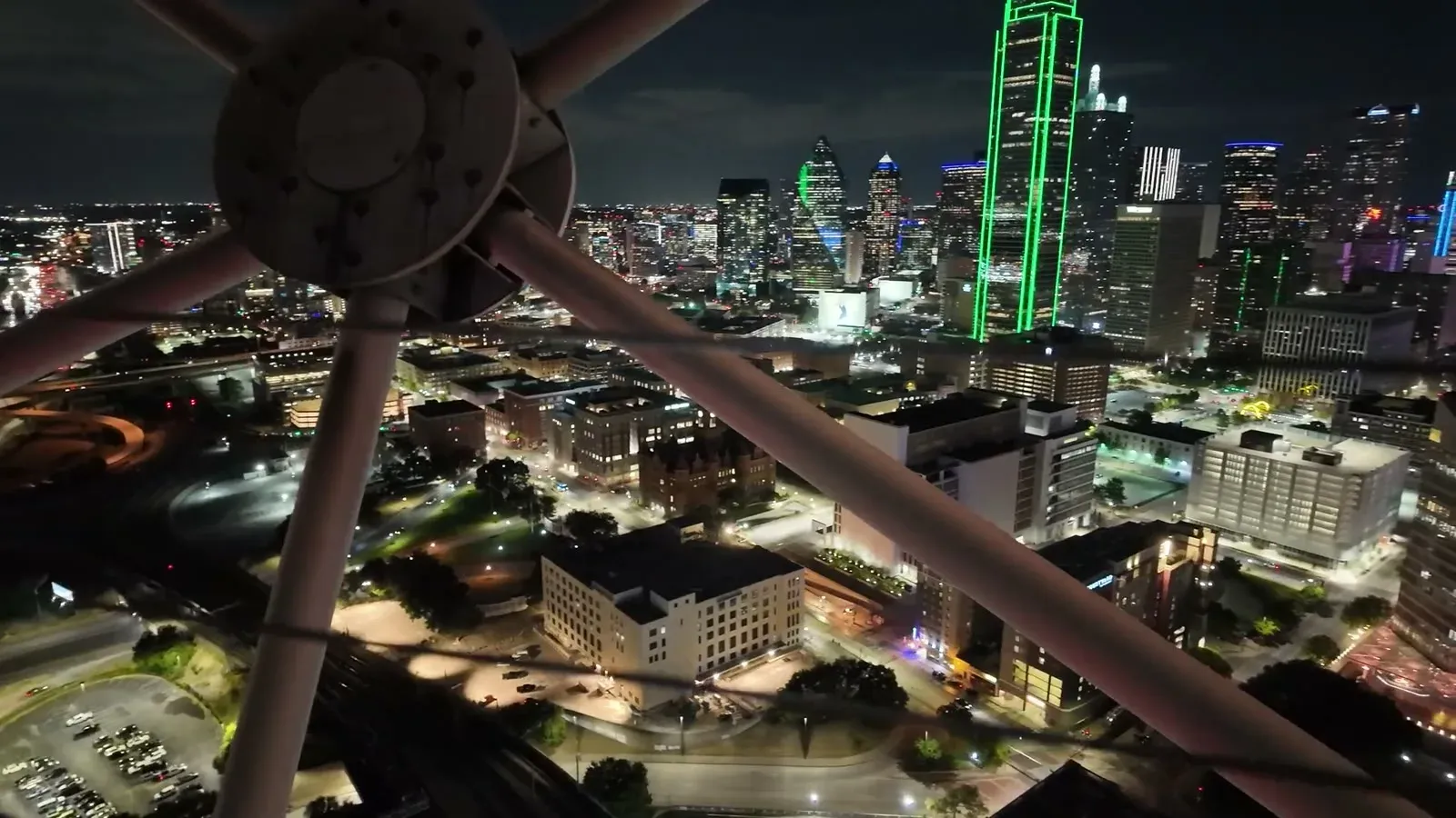 The downtown Dallas skyline lit up at night from the Reunion Tower observation deck.
