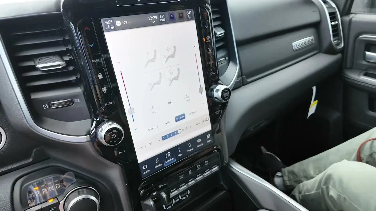 The RAM's center stack with its tall vertical touchscreen, the first hint that one-ton interiors have gotten fancy.