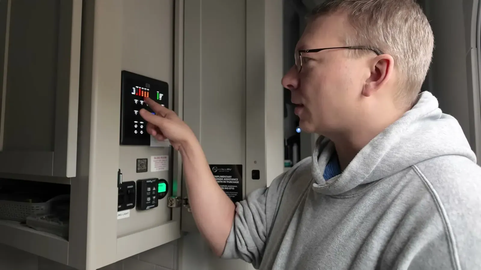 Nathan checks the Brinkley's tank and battery monitor panel, the habit we should have started on day one.