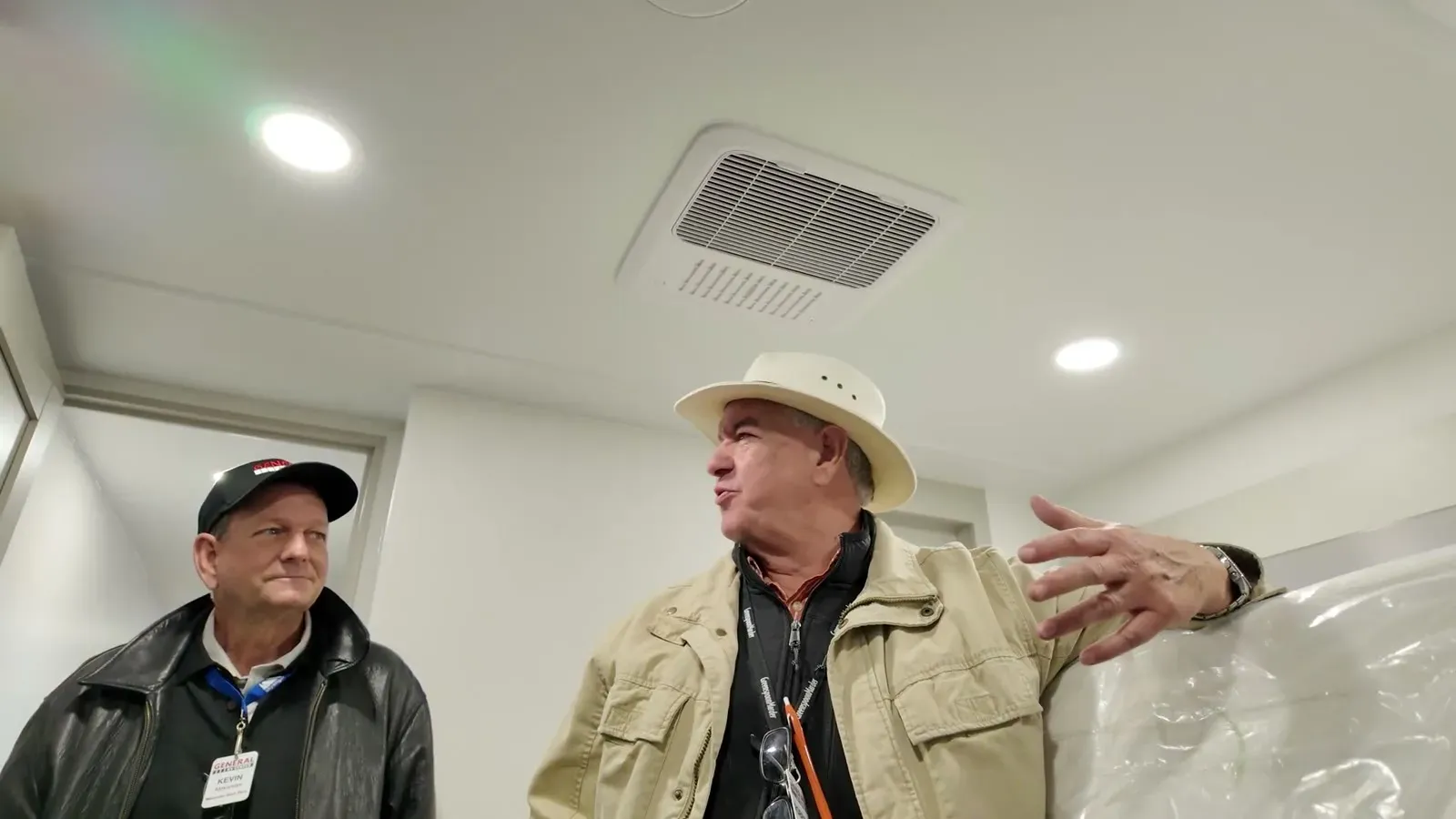 Swapping stories inside the rig with another buyer at the dealership who was starting RV life the same week.