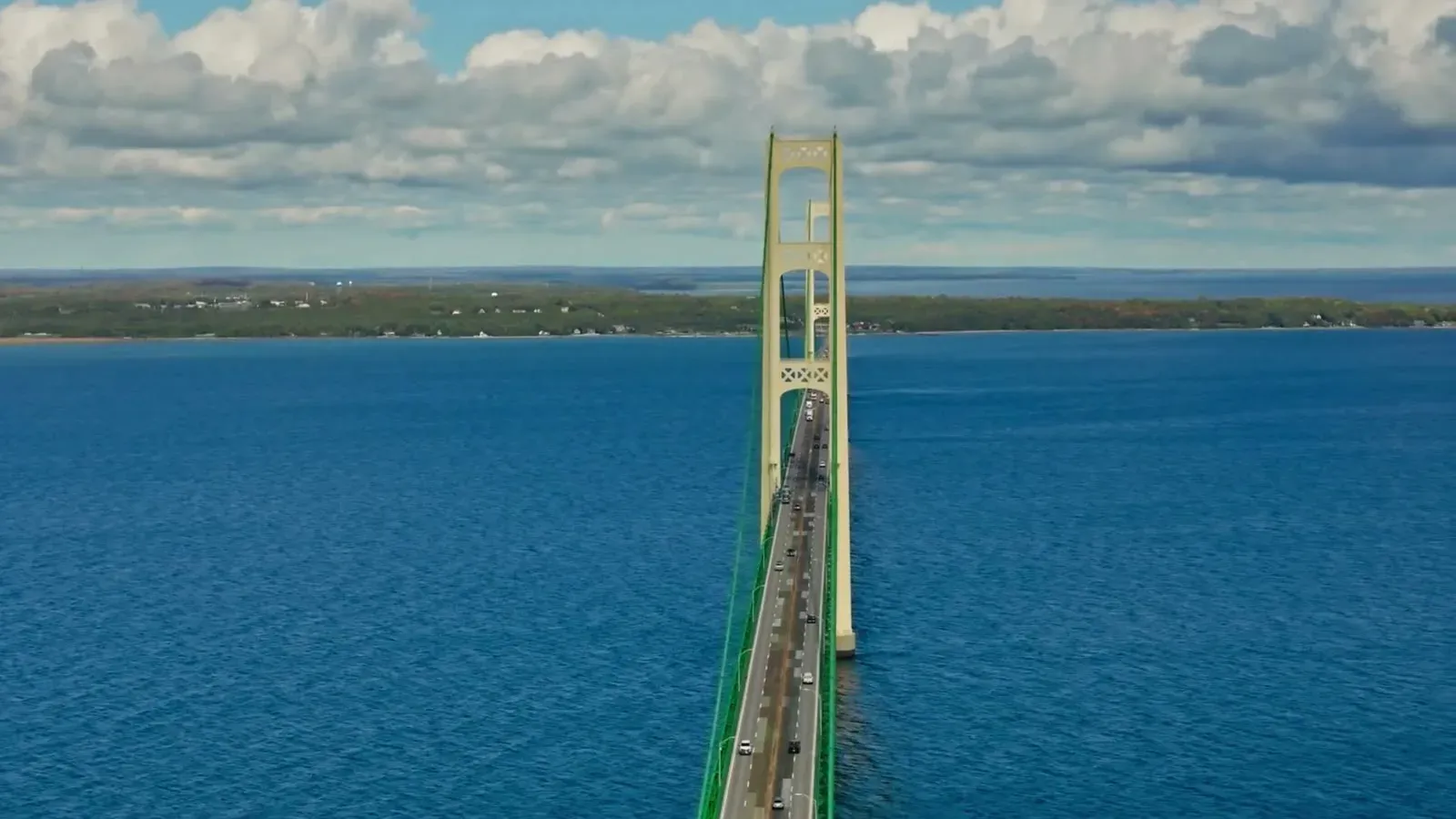 The Mackinac Bridge stretching five miles across the deep blue Straits of Mackinac.