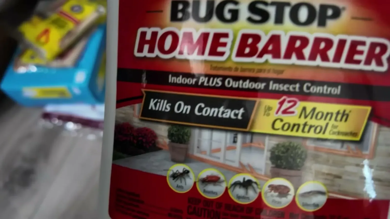 Close-up of a Bug Stop Home Barrier insect control spray bottle used to treat the RV perimeter