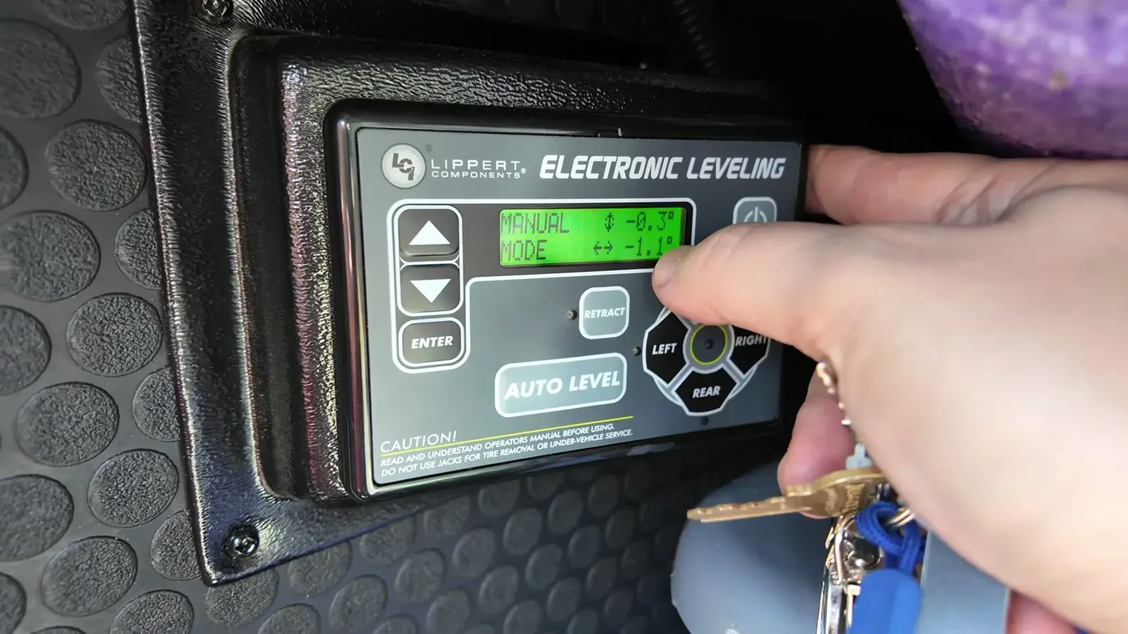 Checking the Lippert electronic leveling panel to see if we could stay hitched