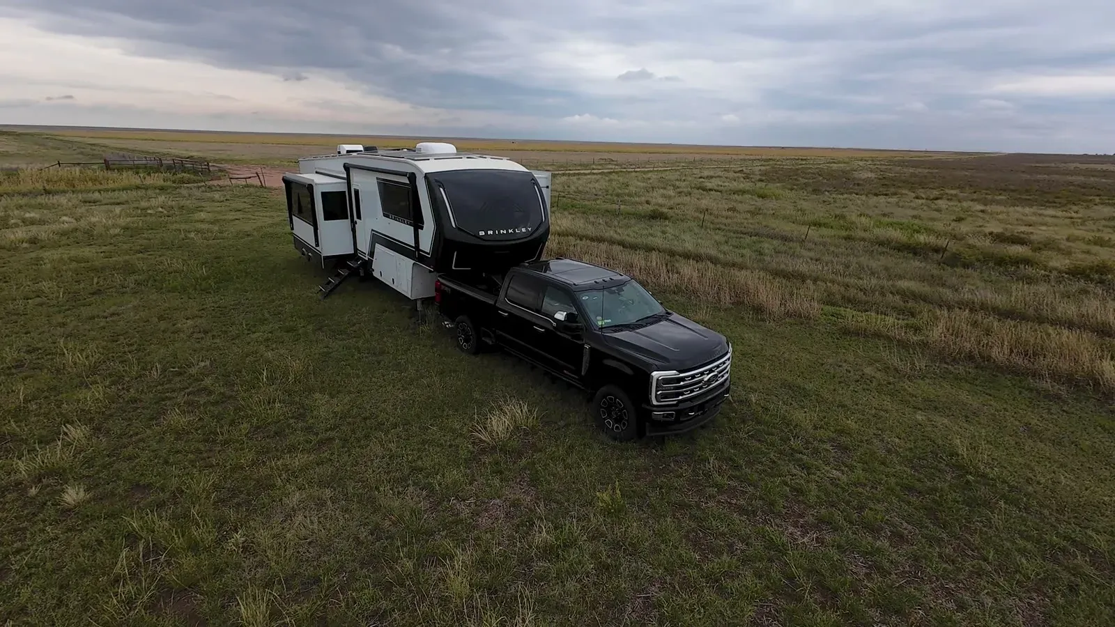 Our Brinkley fifth wheel and F-350 parked alone in open grassland at Rita Blanca National Grassland, Texas