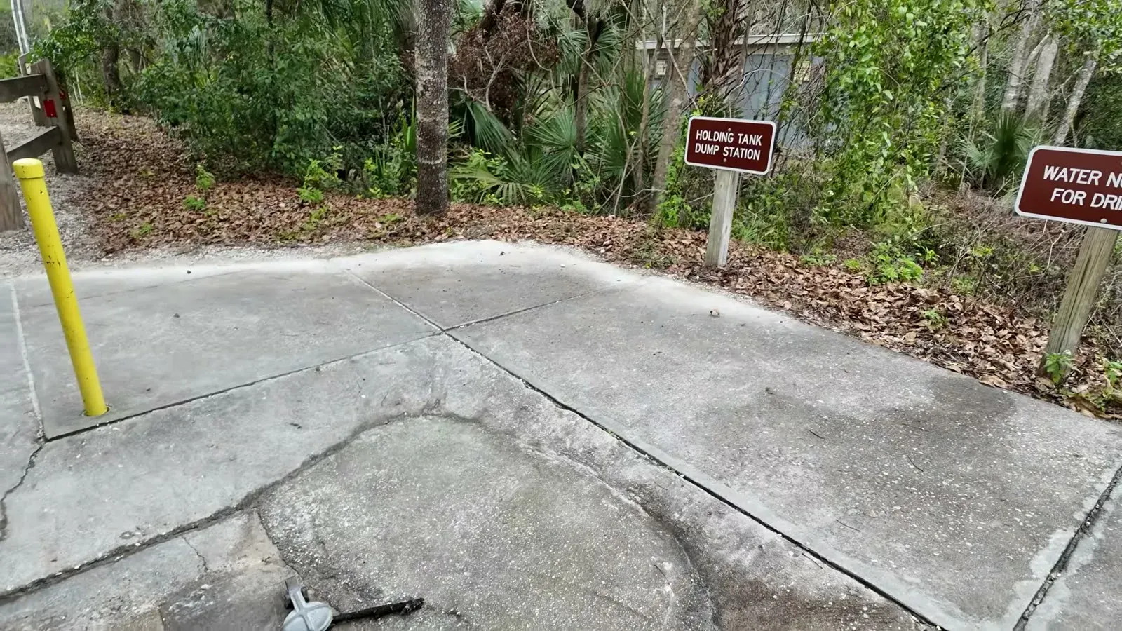 The holding tank dump station sign at the small state park where we dumped our tanks for the first time.